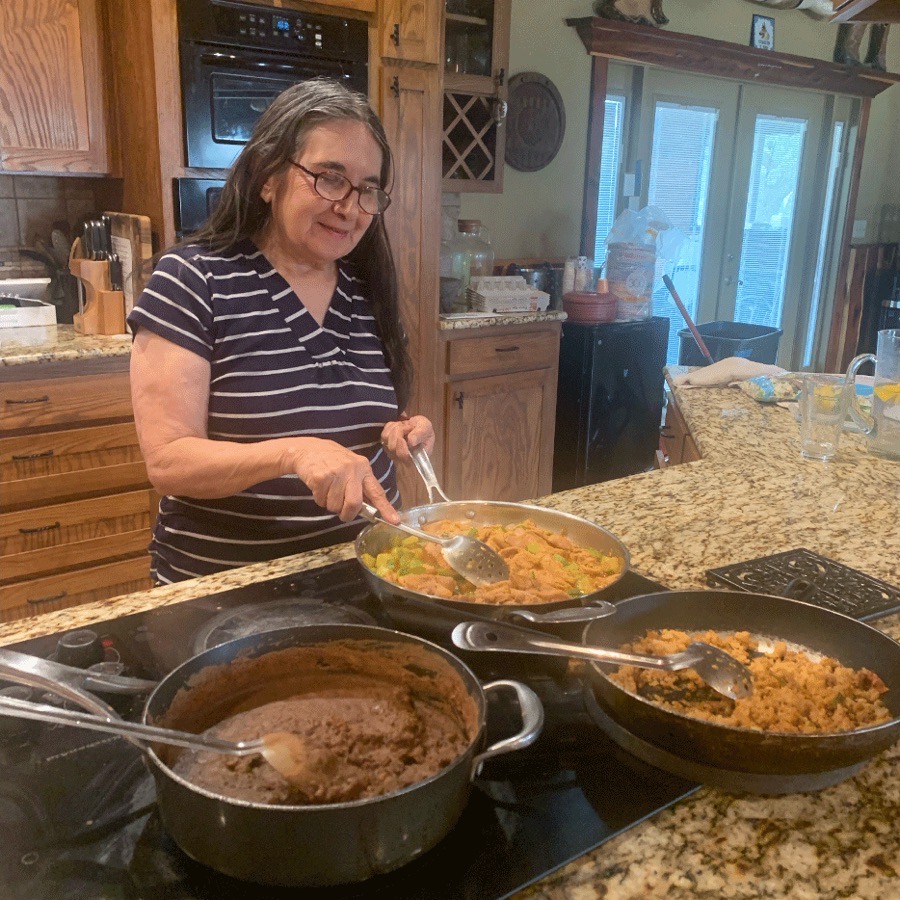 Mary, our guest manager, preparing a homemade meal