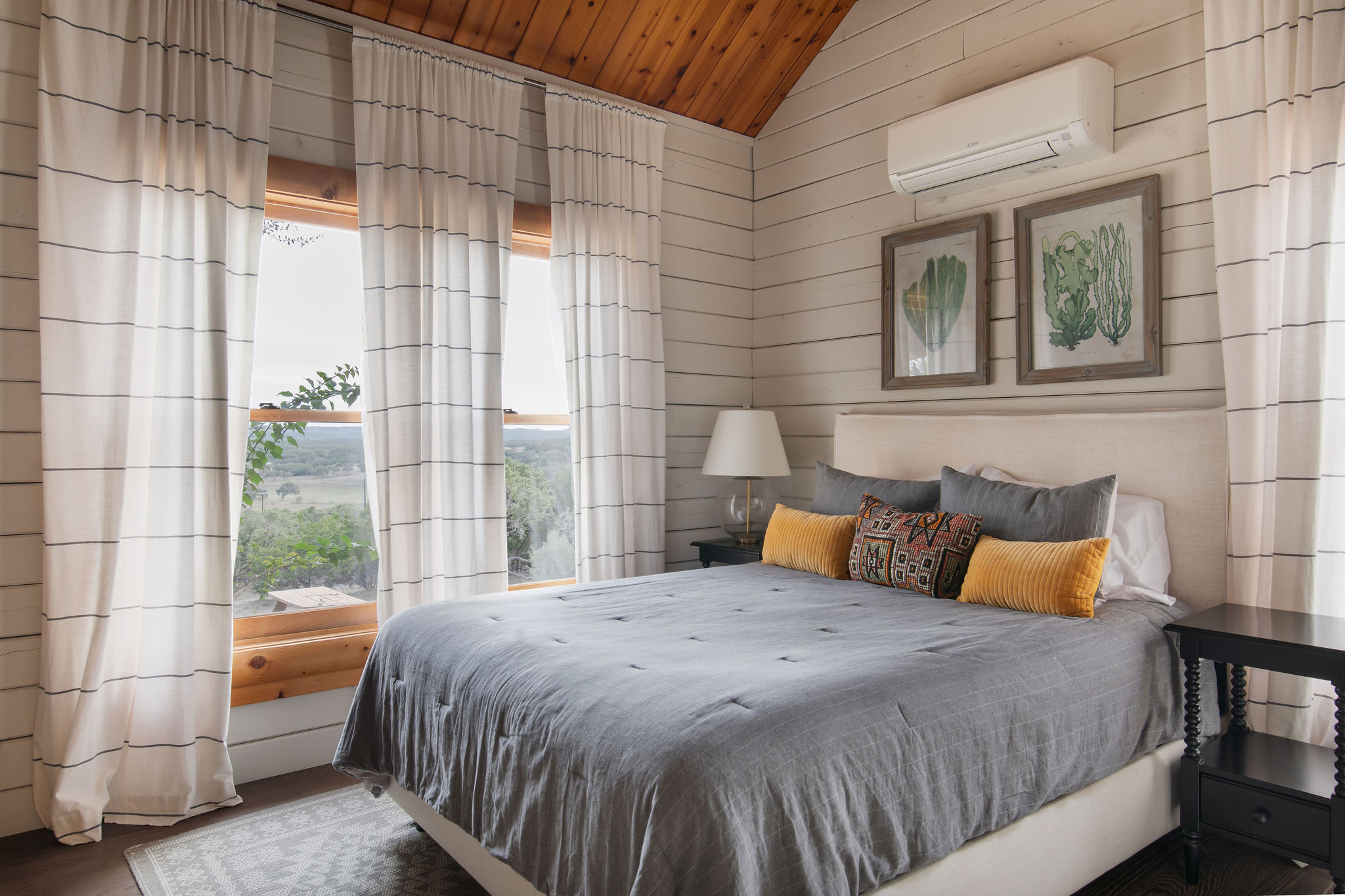 A bedroom looking out over the Hill Country