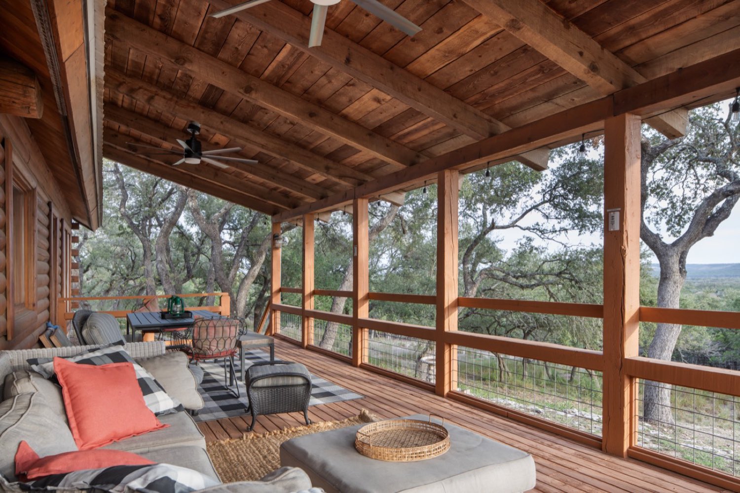 Porch seating under the oaks