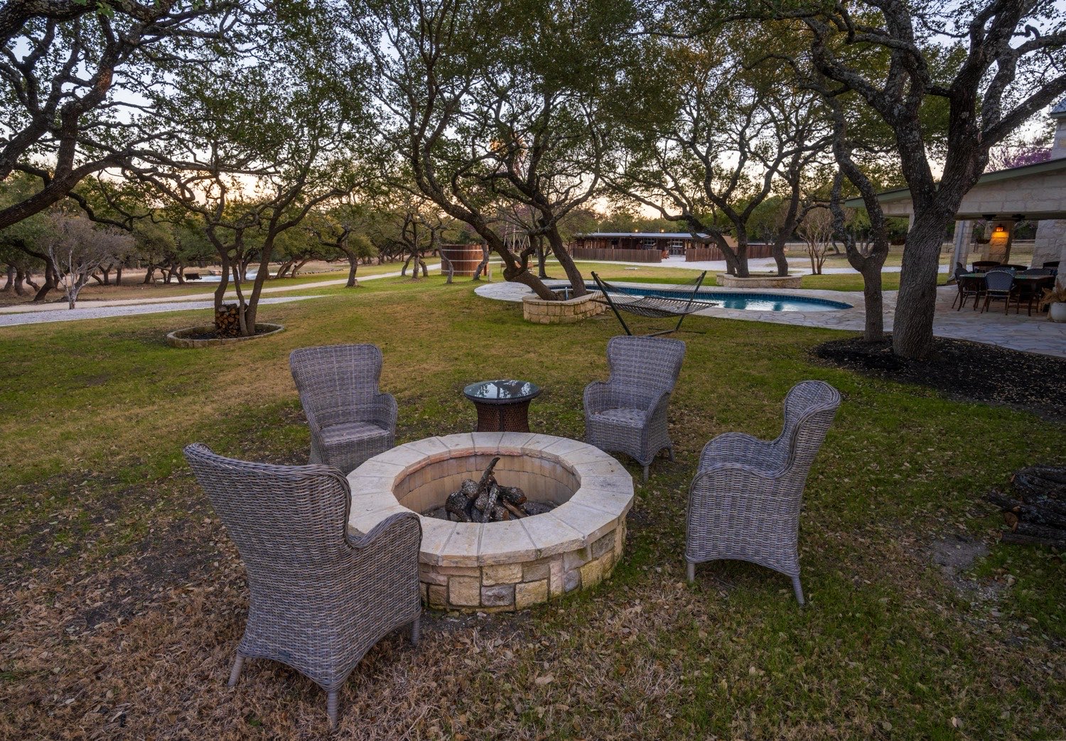The firepit under the oaks