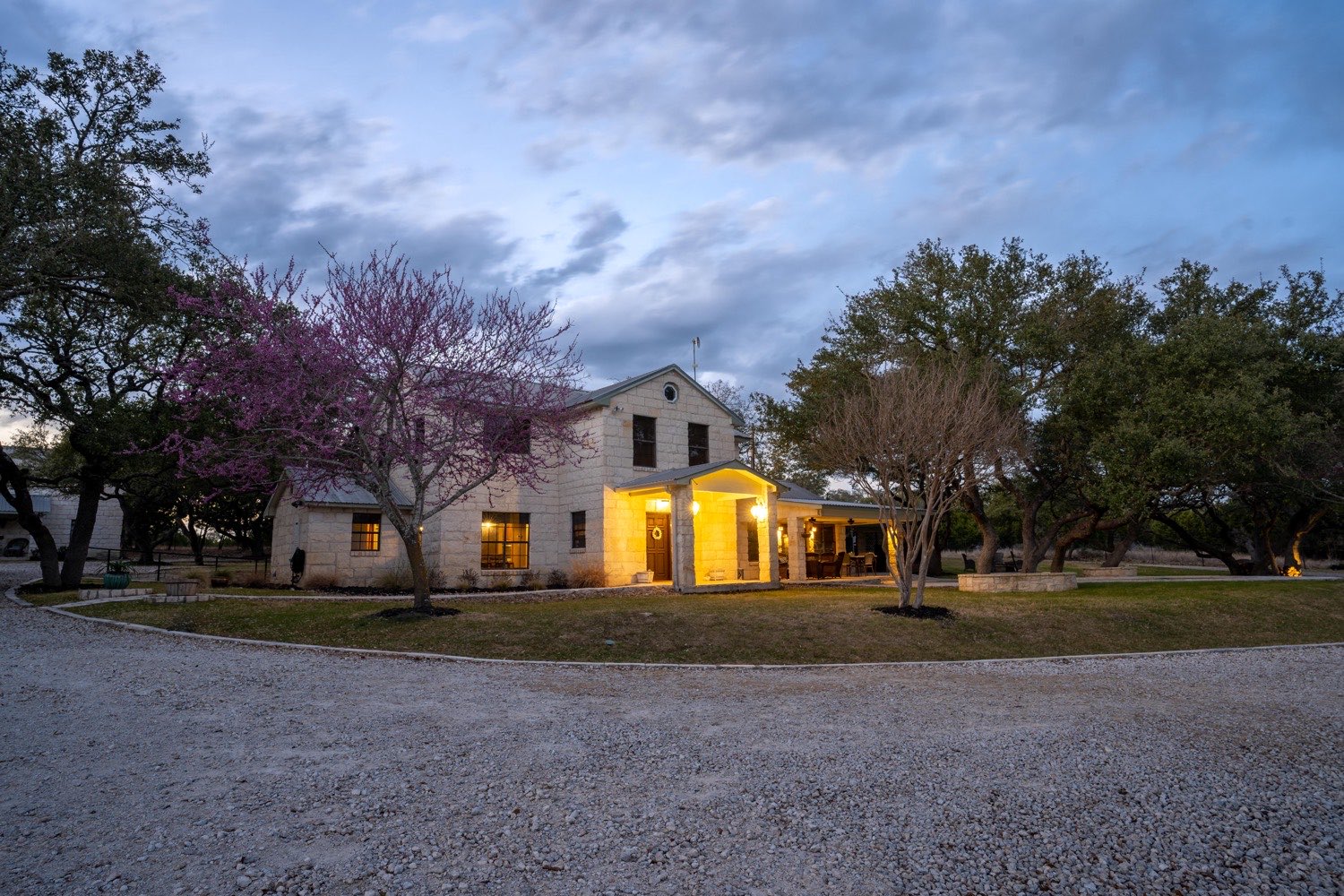 The main house glowing at dusk