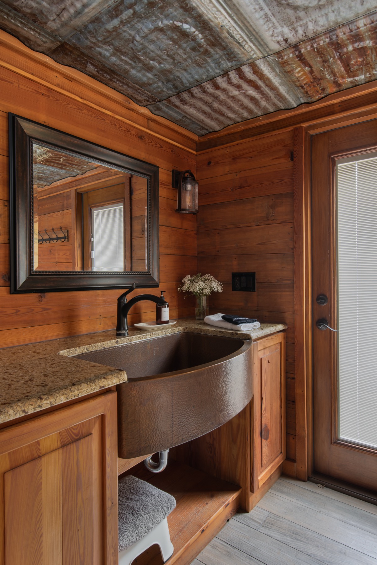 The bunkhouse bath with its copper sink