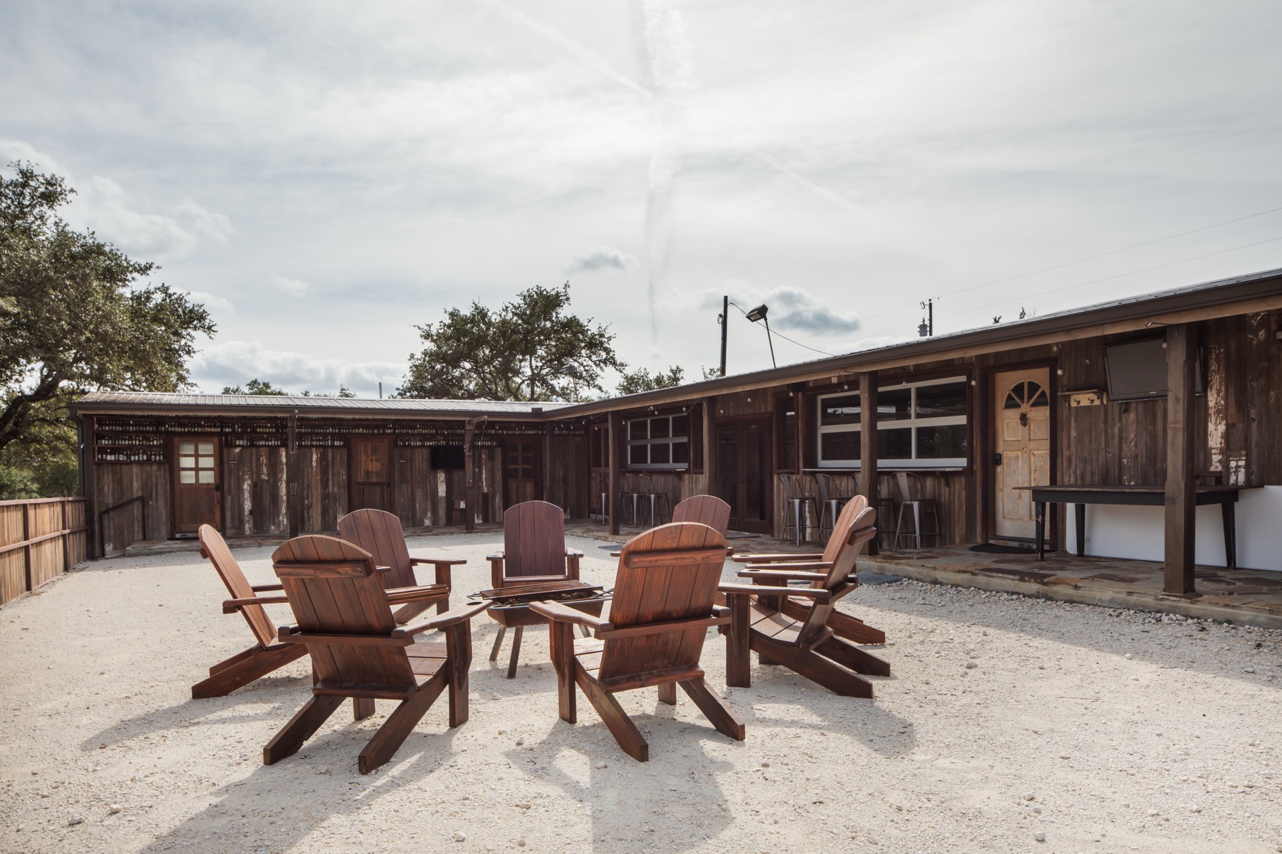 The bunkhouse firepit courtyard